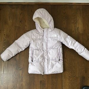 Kids Purple North Face fleece lined jacket.